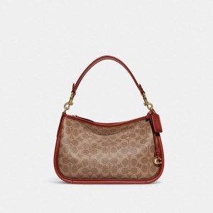 Coach Cary Crossbody Bag In Signature Canvas Signature Coated Canvas/Brass/Tan/Rust | COH865354
