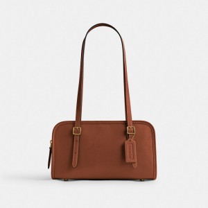 Coach Swing Zip Brass/1941 Saddle | COH864730